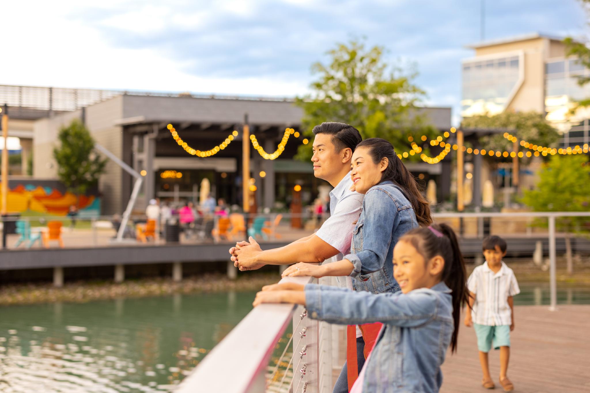 Family at The Boardwalk at Granite Park in Collin County Texas